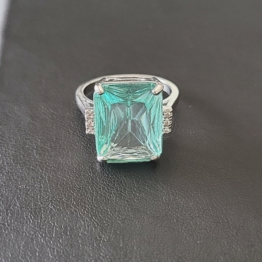 Sea Foam Green Ring with side crystals. Size 8